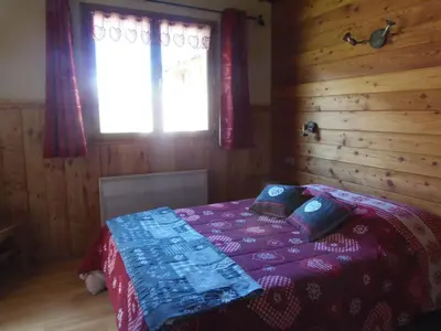 Un ou plusieurs lits dans un hébergement de l'établissement Chalet l'aubépine résidence B&B