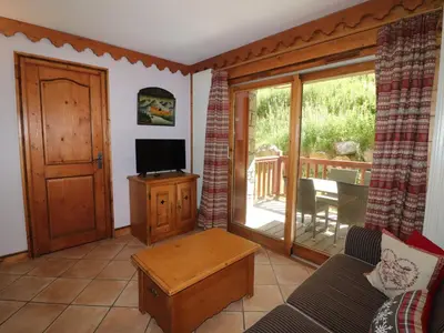 Télévision ou salle de divertissement dans l'établissement Appartement confortable avec terrasse et WIFI - 6 pers - FR-1-502-533
