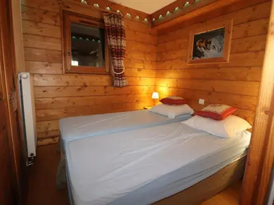 Un ou plusieurs lits dans un hébergement de l'établissement Appartement confortable avec terrasse et WIFI - 6 pers - FR-1-502-533
