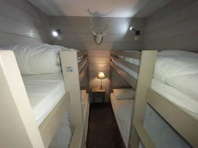 Un ou plusieurs lits dans un hébergement de l'établissement BELLE PLAGNE - Appartement 6 personnes sur les pistes