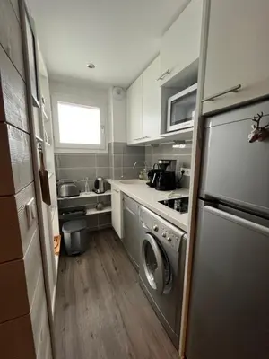 Cuisine ou kitchenette dans l'établissement BELLE PLAGNE - Appartement 6 personnes sur les pistes
