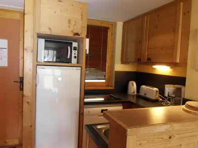Cuisine ou kitchenette dans l'établissement Appartement 3 pièces · Pied des pistes · Balcon · 7 pers - FR-1-181-2721