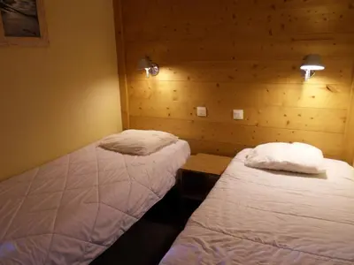 Un ou plusieurs lits dans un hébergement de l'établissement Appartement 3 pièces · Pied des pistes · Balcon · 7 pers - FR-1-181-2721