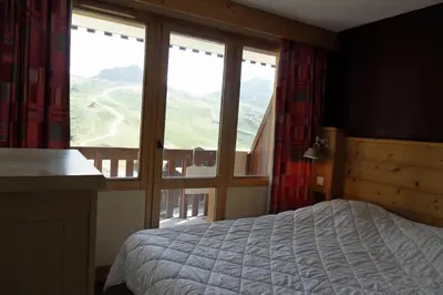 Un ou plusieurs lits dans un hébergement de l'établissement Résidence Nereides - Appartement fonctionnel · Pied des pistes · Vue pistes · Balcon MAE-1864