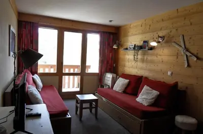 Coin salon dans l'établissement Résidence Nereides - Appartement fonctionnel · Pied des pistes · Vue pistes · Balcon MAE-1864