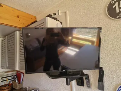 Télévision ou salle de divertissement dans l'établissement Grand Arbois Appartement 5 personnes Les Arcs 1800