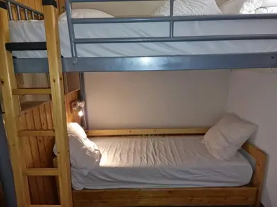 Un ou plusieurs lits dans un hébergement de l'établissement Grand Arbois Appartement 5 personnes Les Arcs 1800