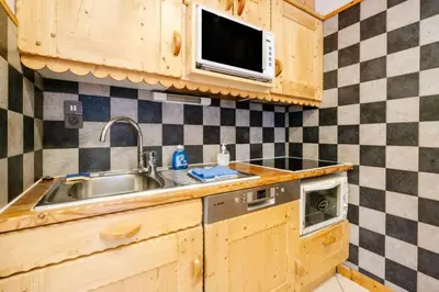 Cuisine ou kitchenette dans l'établissement La turra