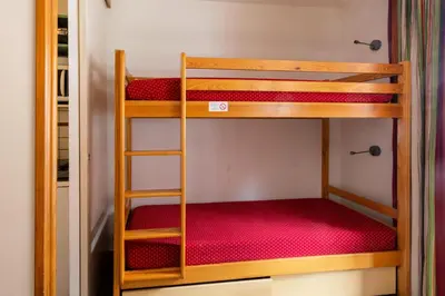 Un ou plusieurs lits superposés dans un hébergement de l'établissement Résidence Les Chalets des Arolles - maeva Home - Studio 4 Personnes - Budget MAE-5804