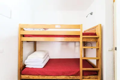 Un ou plusieurs lits dans un hébergement de l'établissement Résidence Les Chalets des Arolles - maeva Home - Studio 5 Personnes - Budget MAE-6424