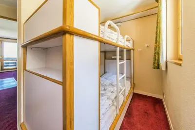 Un ou plusieurs lits superposés dans un hébergement de l'établissement Résidence Les Constellations - maeva Home - Studio 4 Personnes - Confort MAE-4505