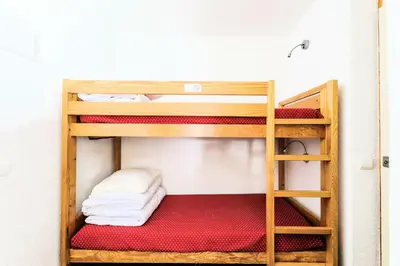 Un ou plusieurs lits dans un hébergement de l'établissement Résidence Les Chalets des Arolles - maeva Home - Studio 5 Personnes - Sélection MAE-0004