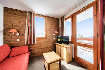 Télévision ou salle de divertissement dans l'établissement Résidence Les Chalets des Arolles - maeva Home - Studio 4 Personnes - Confort MAE-6544