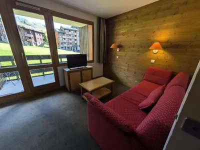 Coin salon dans l'établissement Résidence Les Chalets des Arolles - maeva Home - Studio 5 Personnes - Confort MAE-6414