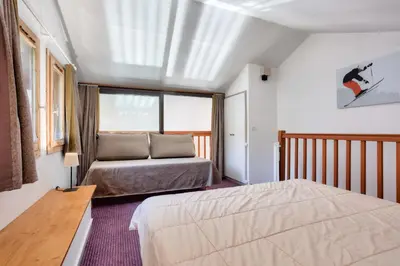 Un ou plusieurs lits dans un hébergement de l'établissement Résidence Les Chalets de Solaise - maeva Home - Studio 5 personnes - Sélection MAE-3904