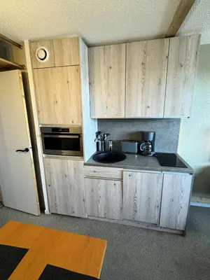Cuisine ou kitchenette dans l'établissement Résidence Les Constellations - maeva Home - Studio 4 Personnes - Confort MAE-2024