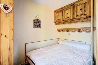 Un ou plusieurs lits dans un hébergement de l'établissement Résidence Callisto - maeva Home - Appartement 3 pièces 6 personnes - Budget MAE-8964