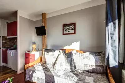 Un ou plusieurs lits dans un hébergement de l'établissement Résidence Les Constellations - maeva Home - 2 pièces 7 personnes Selection MAE-0489