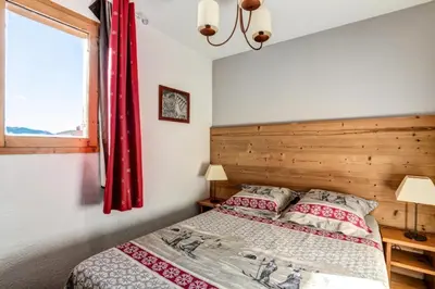 Un ou plusieurs lits dans un hébergement de l'établissement Résidence Les Constellations - maeva Home - 2 pièces 7 personnes Selection MAE-0489
