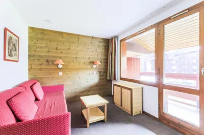 Coin salon dans l'établissement Résidence Les Chalets des Arolles - maeva Home - Studio 5 personnes Confort MAE-6380