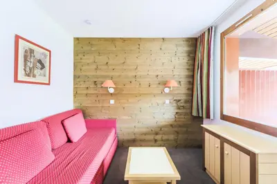 Un ou plusieurs lits dans un hébergement de l'établissement Résidence Les Chalets des Arolles - maeva Home - Studio 5 personnes Confort MAE-6380