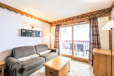 Coin salon dans l'établissement Résidence L'Ecrin des Neiges - maeva Home - Appartement 4 Pièces 8 Personnes - Sélection MAE-2873