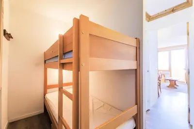 Un ou plusieurs lits dans un hébergement de l'établissement Résidence Les Constellations - maeva Home - Studio 4 personnes Confort MAE-5086