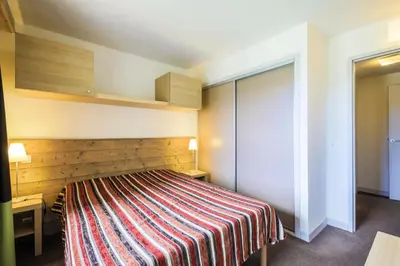 Un ou plusieurs lits dans un hébergement de l'établissement Résidence Les Gémeaux - maeva Home - Appartement 2 pièces 5 personnes - Confort MAE-3621