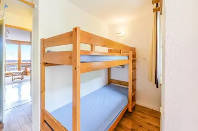 Un ou plusieurs lits dans un hébergement de l'établissement Résidence Les Constellations - maeva Home - Studio 5 Personnes Sélection MAE-8748