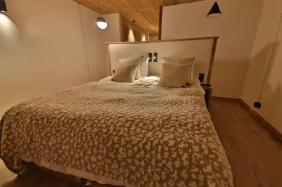 Un ou plusieurs lits dans un hébergement de l'établissement Epicime Lodge