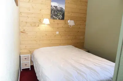 Un ou plusieurs lits dans un hébergement de l'établissement Résidence Themis - Appartement chaleureux · Ski aux pieds · Vue pistes MAE-8284
