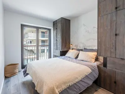 Un ou plusieurs lits dans un hébergement de l'établissement Bel appartement avec wifi, garage, cheminée et grande terrasse au pied des pistes à Val-d'Isère - FR-1-694-325