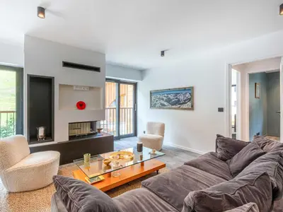 Coin salon dans l'établissement Bel appartement avec wifi, garage, cheminée et grande terrasse au pied des pistes à Val-d'Isère - FR-1-694-325