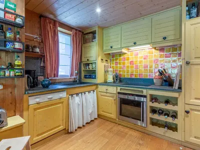 Cuisine ou kitchenette dans l'établissement Duplex de standing au pied des pistes avec cheminée, terrasse et garage – Modane - FR-1-694-329
