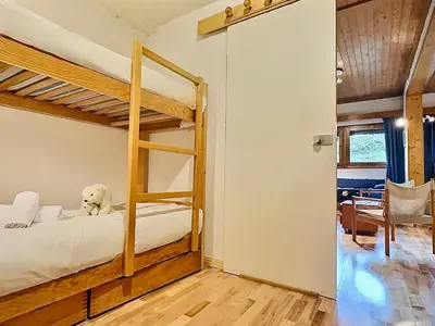Un ou plusieurs lits dans un hébergement de l'établissement Grand T3 à Val d'Isère avec deux salles de bain - FR-1-411-898