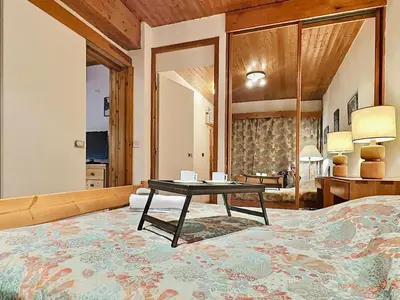 Un ou plusieurs lits dans un hébergement de l'établissement Grand T3 à Val d'Isère avec deux salles de bain - FR-1-411-898