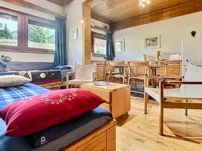 Coin salon dans l'établissement Grand T3 à Val d'Isère avec deux salles de bain - FR-1-411-898