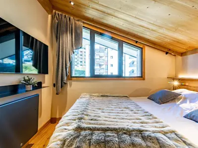 Un ou plusieurs lits dans un hébergement de l'établissement Apartment Rond Point des Pistes - Val Claret-21 by Interhome