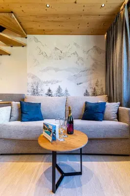 Coin salon dans l'établissement Apartment Rond Point des Pistes - Val Claret-21 by Interhome