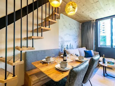 Coin salon dans l'établissement Apartment Rond Point des Pistes - Val Claret-21 by Interhome