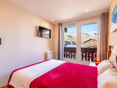 Un ou plusieurs lits dans un hébergement de l'établissement Apartment Chalet Club - Val Claret-8 by Interhome