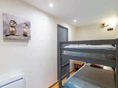 Un ou plusieurs lits dans un hébergement de l'établissement Apartment Chalet Club - Val Claret-8 by Interhome
