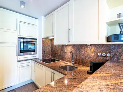 Cuisine ou kitchenette dans l'établissement Apartment Le Shamrock - Le Lac-6 by Interhome