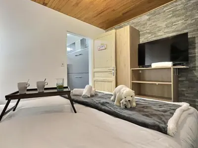 Télévision ou salle de divertissement dans l'établissement Appartement Tignes 2100 - 4-6 personnes - 1 chambre - 4 lits - Wifi haut débit - Parking couvert inclus