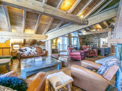 Coin salon dans l'établissement Duplex luxueux avec sauna, cheminée et parking à Val-d'Isère - FR-1-694-334