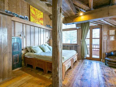 Un ou plusieurs lits dans un hébergement de l'établissement Duplex luxueux avec sauna, cheminée et parking à Val-d'Isère - FR-1-694-334