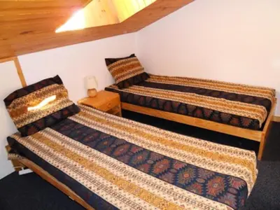 Un ou plusieurs lits dans un hébergement de l'établissement Résidence Croix Du Sud - Studio fonctionnel · Centre station · Vue pistes · Casier à skis MAE-6404