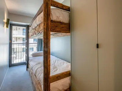 Un ou plusieurs lits dans un hébergement de l'établissement Appartement de standing avec garage, wifi et terrasse au pied des pistes à Val-d'Isère - FR-1-694-332