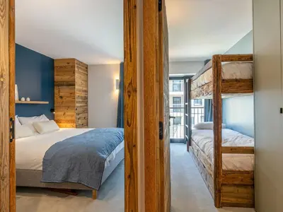 Un ou plusieurs lits dans un hébergement de l'établissement Appartement de standing avec garage, wifi et terrasse au pied des pistes à Val-d'Isère - FR-1-694-332