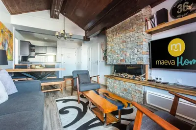 Télévision ou salle de divertissement dans l'établissement Résidence Les Arcs 1950 Le Village - maeva Home - Appartement 3 pièces 6 personnes vue sur le Mont Blanc - Prestige - super Home MAE-4490